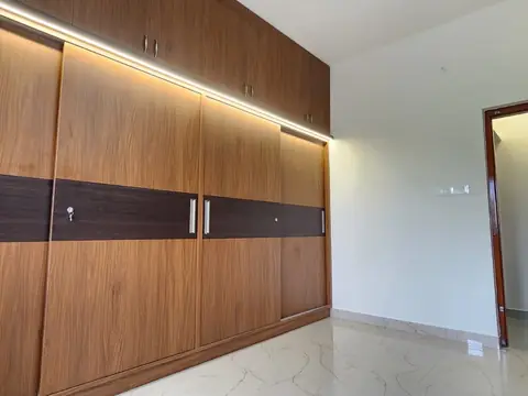 Bedroom with walnut sliding wardrobe and LED strip light, Villa 1