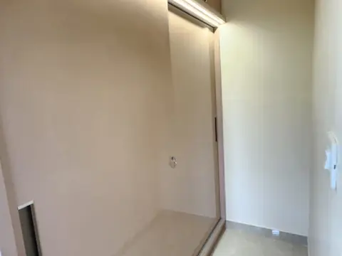 Full-height bedroom wardrobe with overhead storage, Villa 1