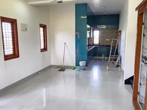 Living hall with cove-lit false ceiling and glossy flooring, Villa 1