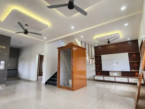 Living room with TV unit, false ceiling and staircase, Villa 2