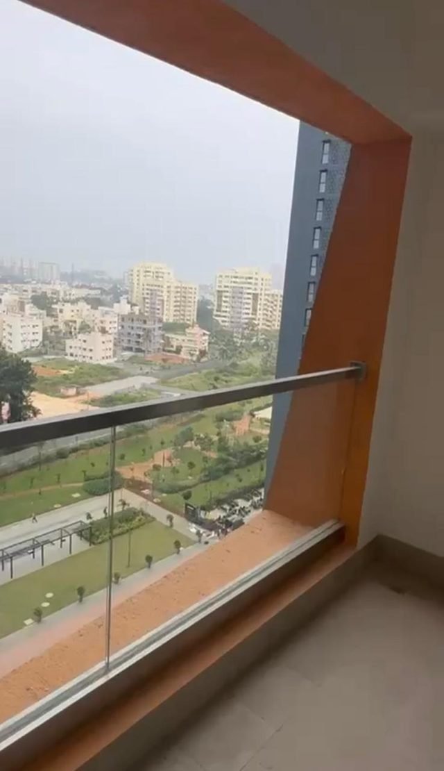 View over the landscaped gardens from the hall balcony, 24th floor, Purva Atmosphere