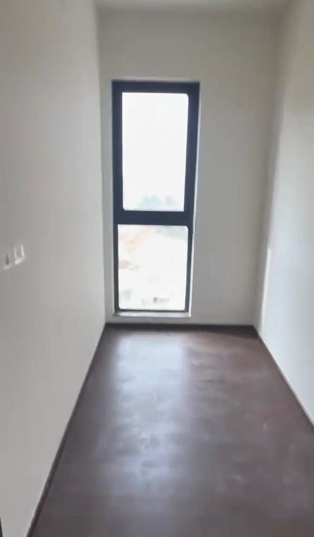 Room with a tall window, 24th floor 3 BHK in Purva Atmosphere