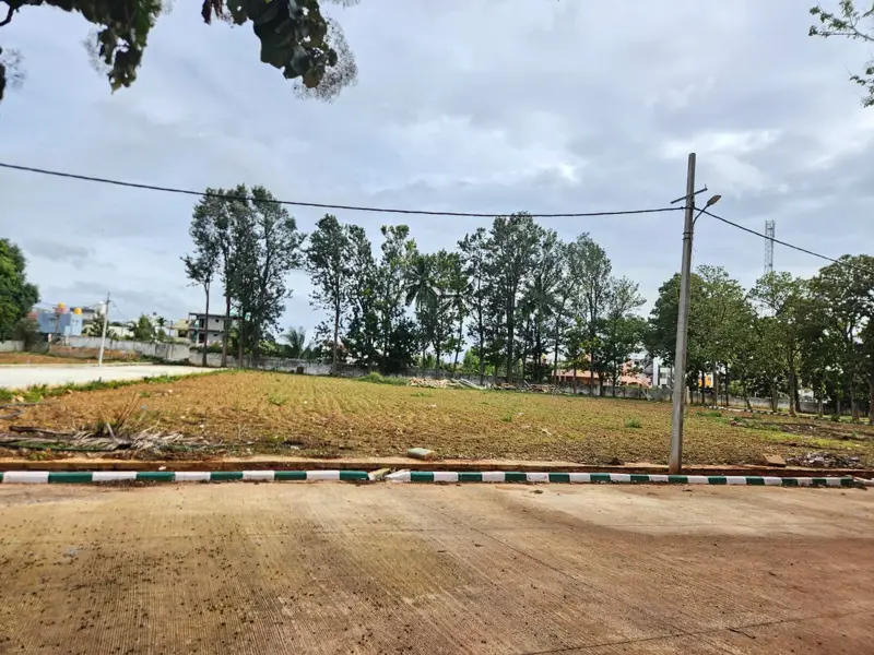 Plot frontage with green and white kerb, Yelahanka North Bangalore
